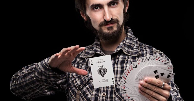 Magician - Person Doing Card Trick