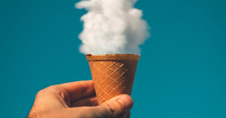 Creativity - Man Holding Ice Cream Cone Under Cloud