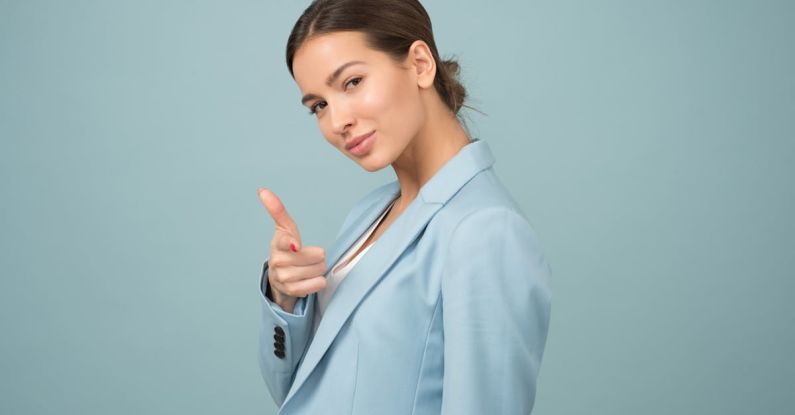 Confidence - Woman Wearing Blue Shawl Lapel Suit Jacket